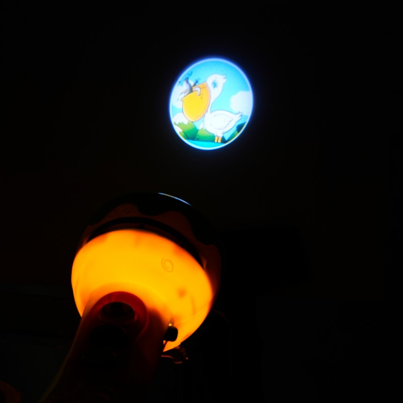 Children's flashlight - projector with music and lights with 4 discs GOT