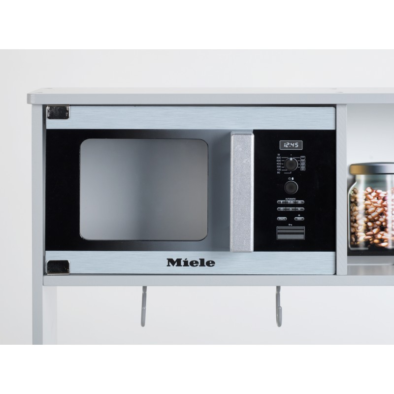 Theo Klein 7199 Miele Kitchen I White wooden kitchen incl. hob, with sound and light I Dimensions: 70 cm x 30 cm x 91 cm | High-class kitchen accessories made of stainless steel (should not be heated up) and wood | Toy for children aged 3 years and up Miele