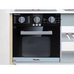 Theo Klein 7199 Miele Kitchen I White wooden kitchen incl. hob, with sound and light I Dimensions: 70 cm x 30 cm x 91 cm | High-class kitchen accessories made of stainless steel (should not be heated up) and wood | Toy for children aged 3 years and up Miele 46006 5